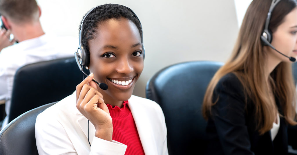 Happy pharma sales rep talking to physicians remotely